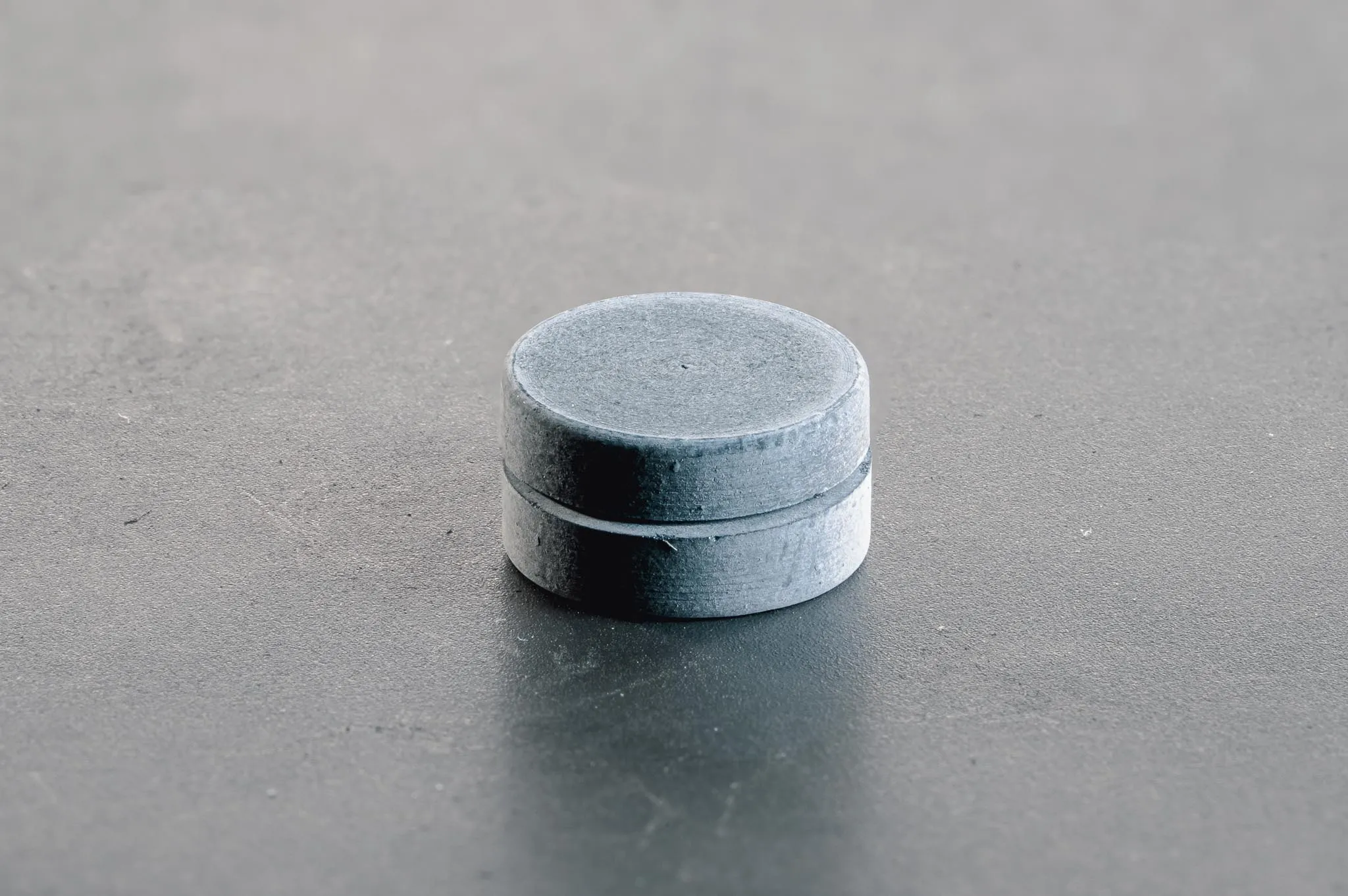 Bulk yttrium hydride (YHx) sample fabricated for use as a high-performance neutron moderator in advanced microreactors.